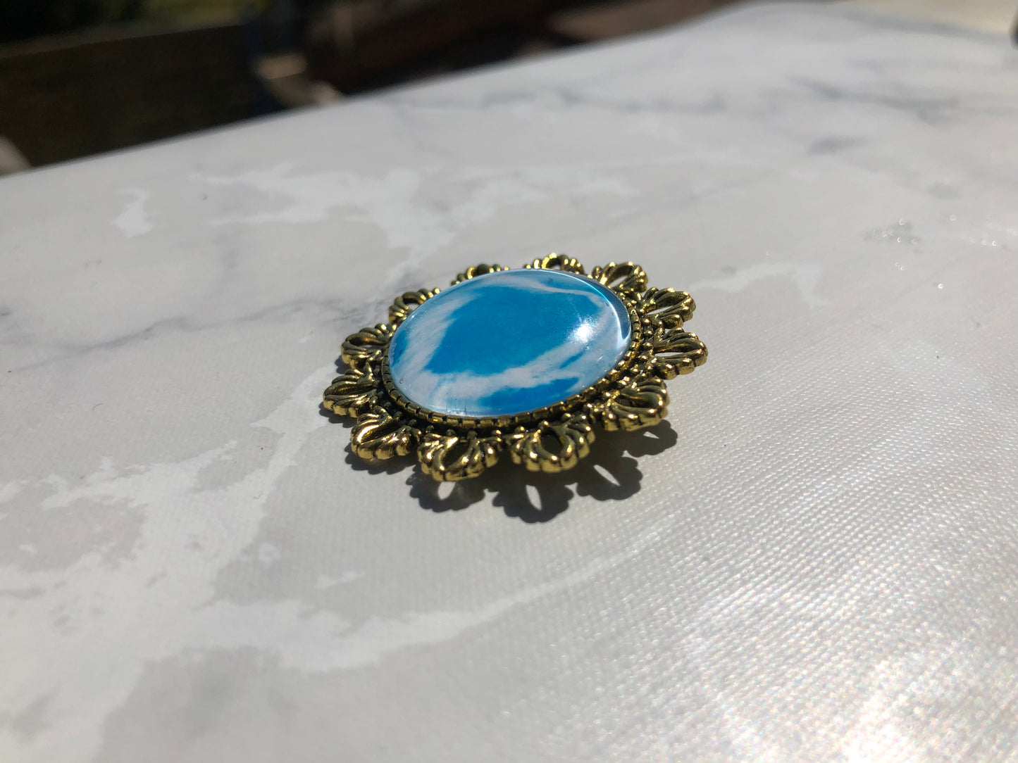 Broche dorée ancienne style baroque